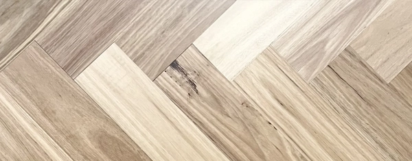 Herringbone parquet laminate flooring fitted in a Bristol home