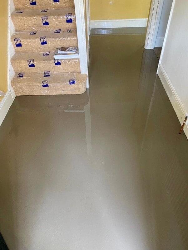 Room with old flooring removed before carpet or vinyl installation Bristol